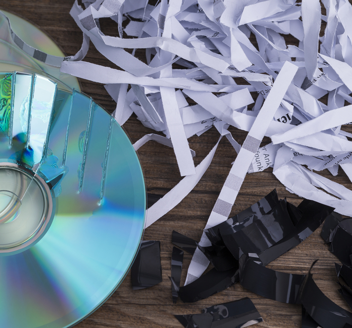 shredded paper and digital media