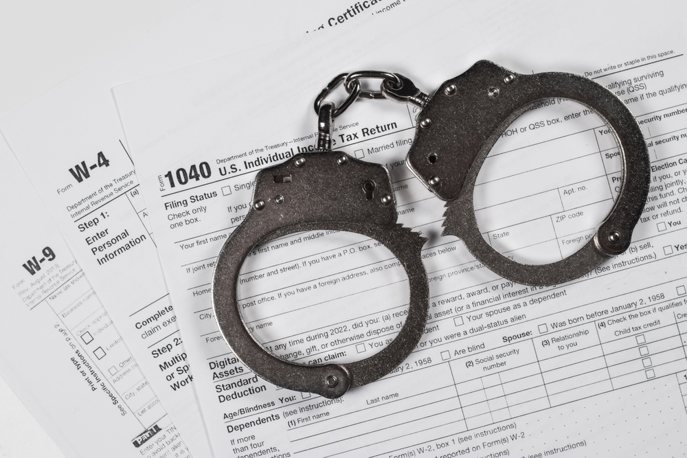 handcuffs on a tax return document