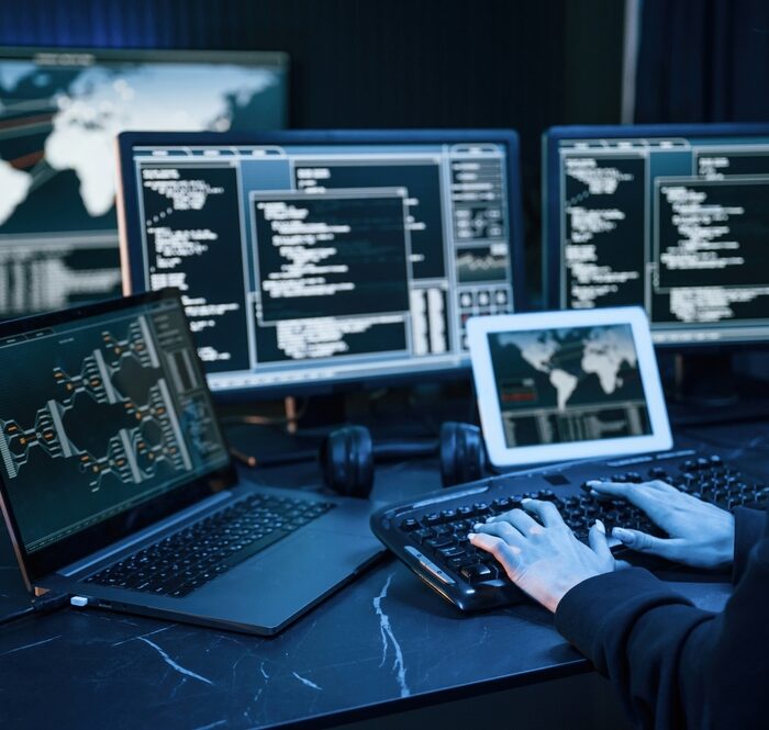 person using a computer in a dark room