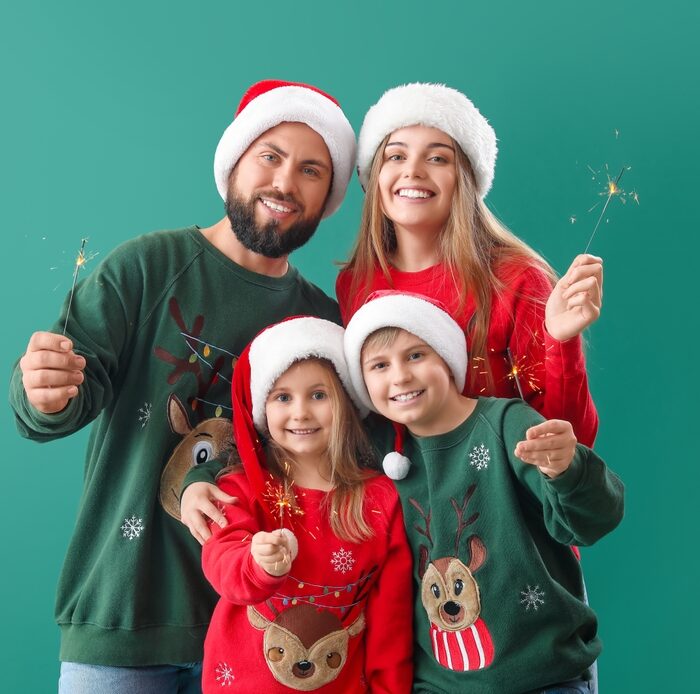 Happy Family In Santa Hats