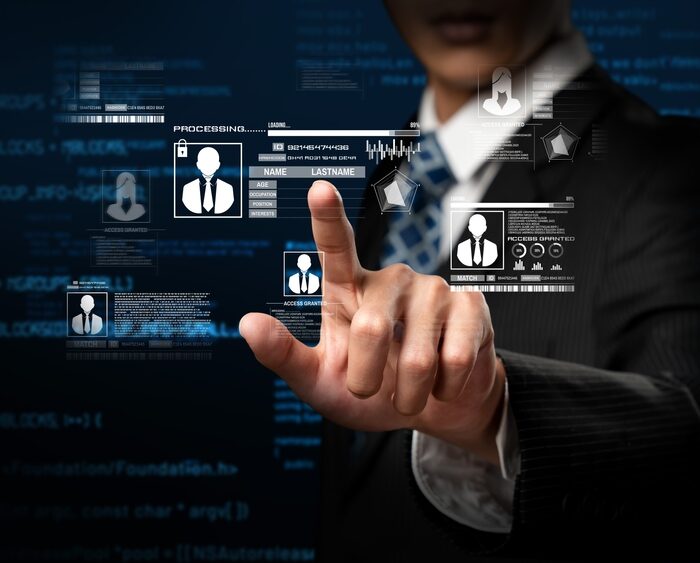 person logging in on a touch screen