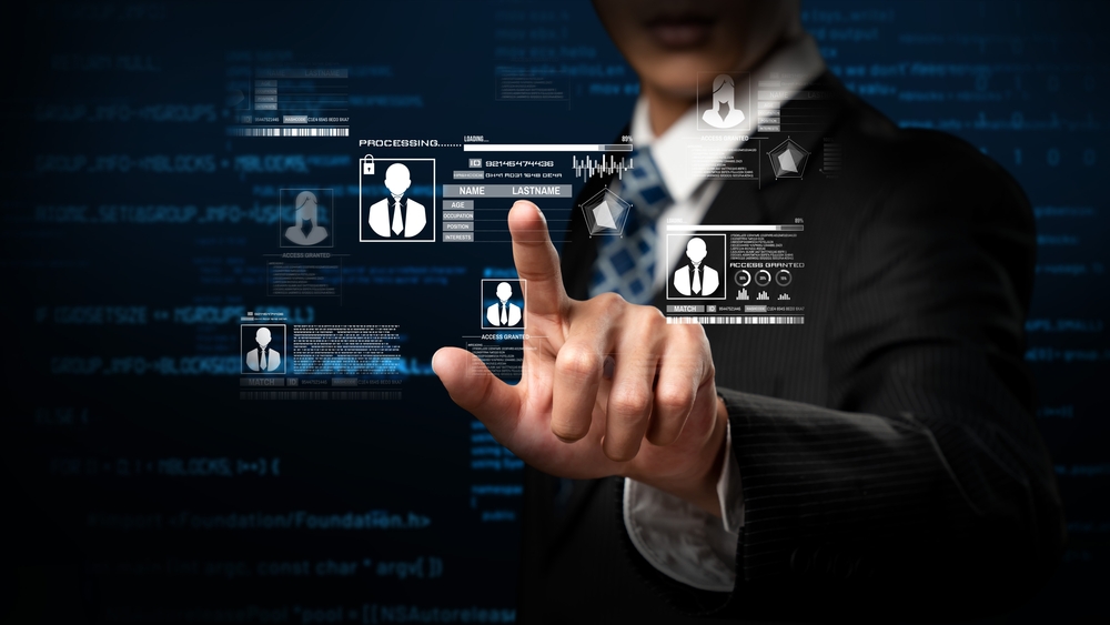 person logging in on a touch screen