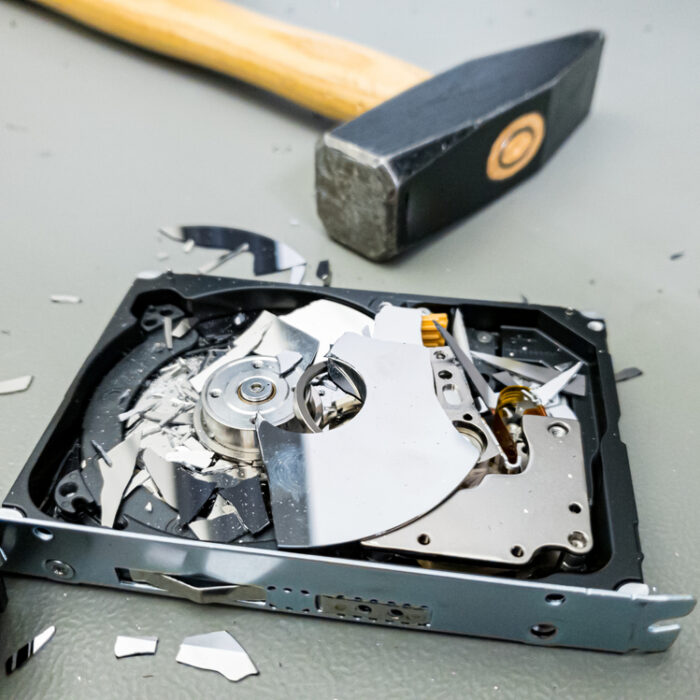 destroying a hard drive with a hammer