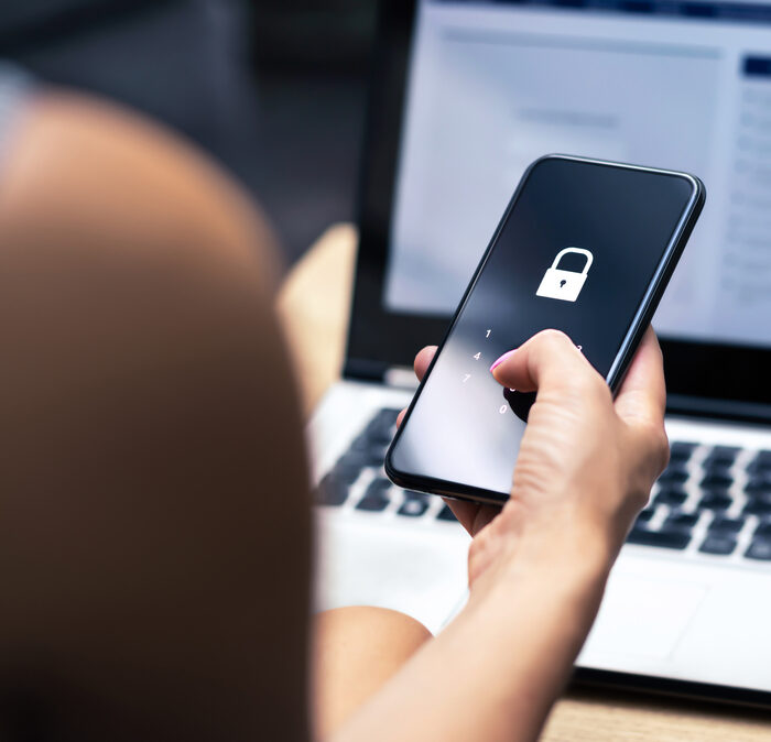 person logging in on a mobile phone