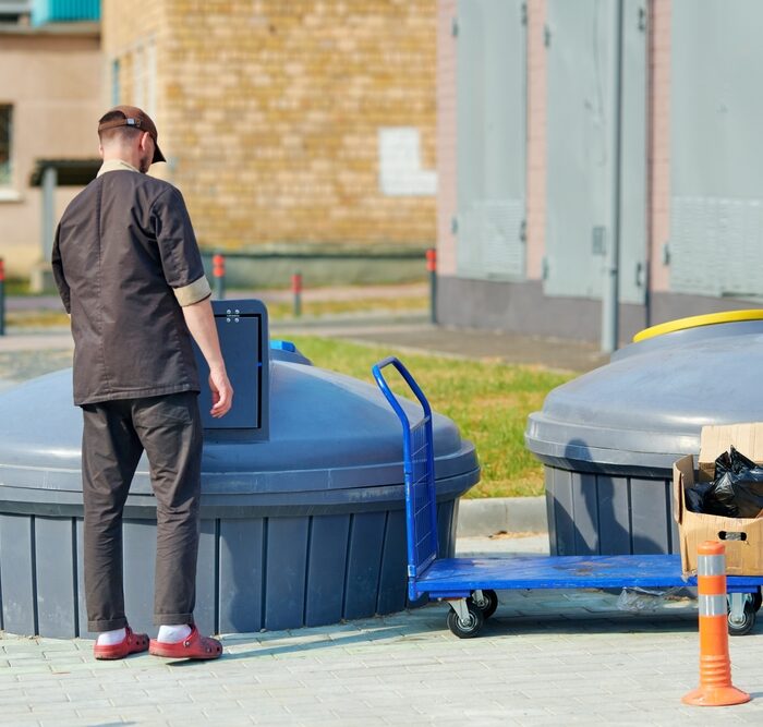 person discarding trash