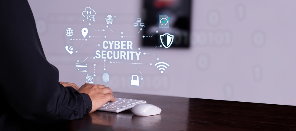 cyber security graphic over a computer keyboard