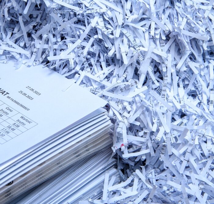 pile of paper and shredded paper