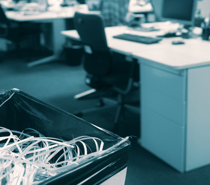 bin of shredded paper in an office