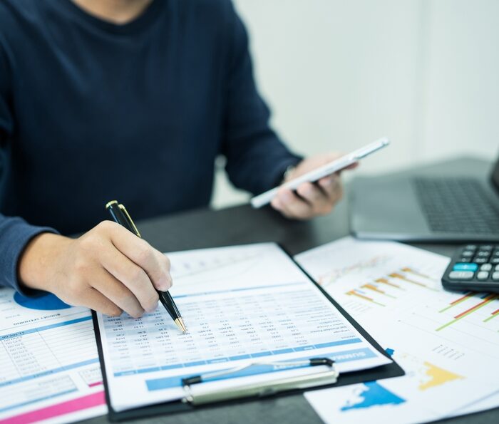 person reviewing tax documents