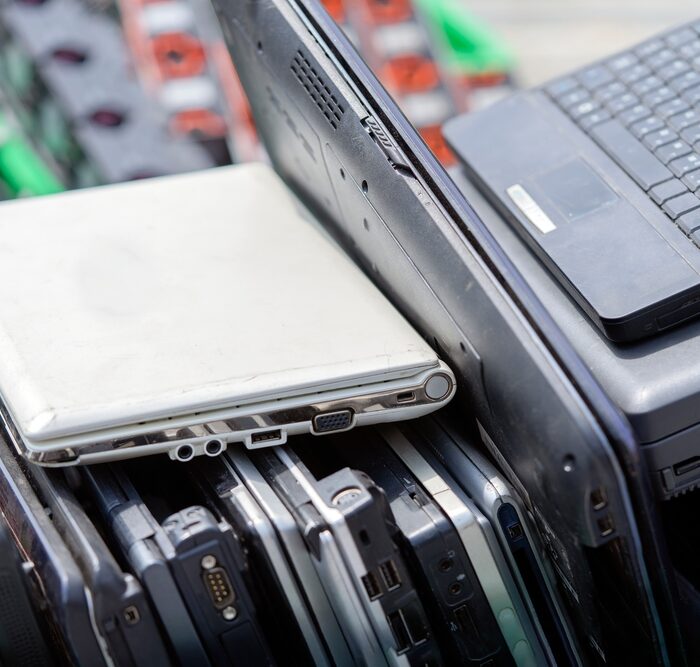 pile of old laptops
